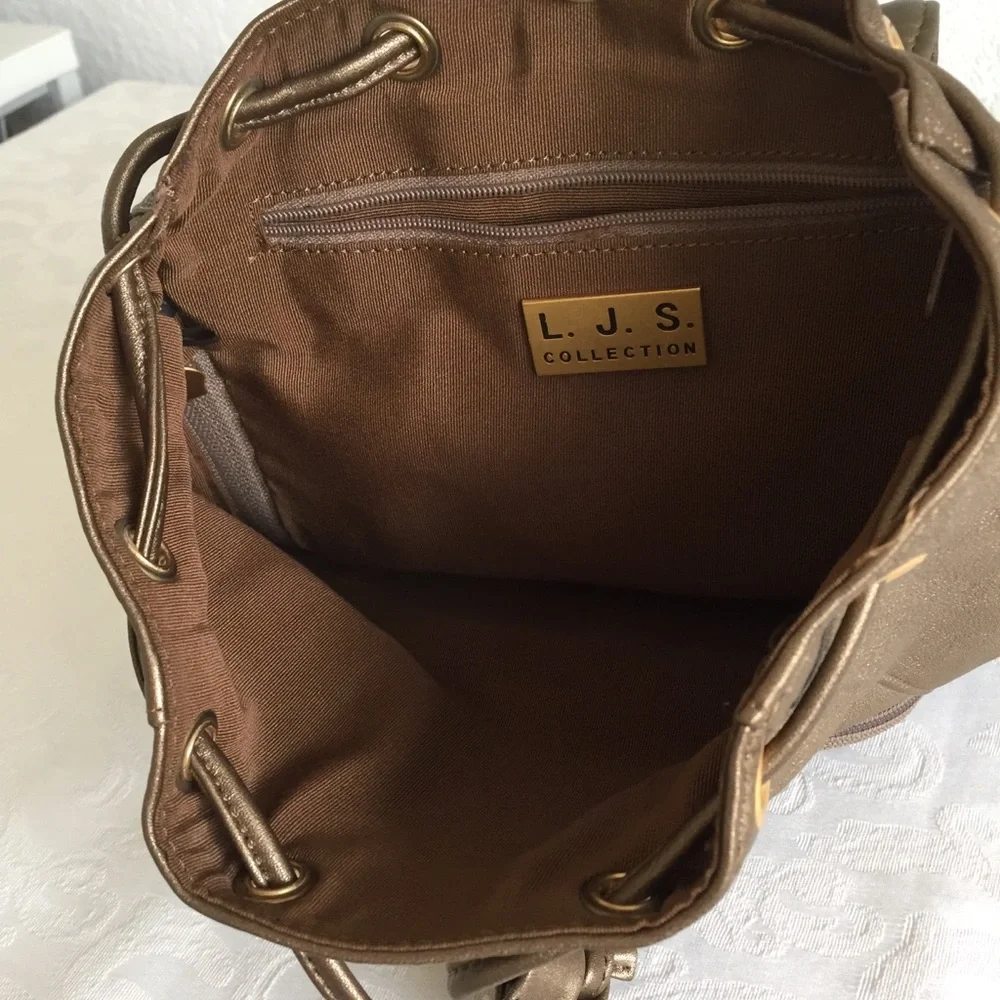 Gold bronze leather backpack